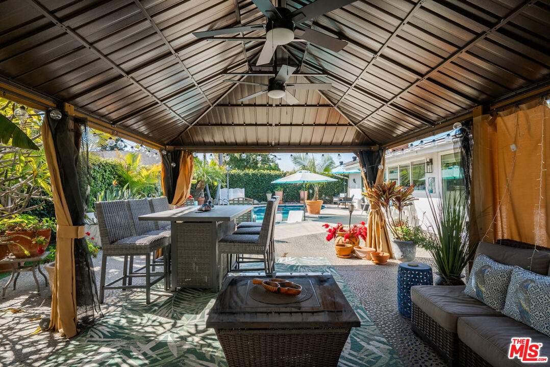 11332 Loch Lomond Road Los Alamitos, CA 90720 - Photo 45 of 55 a outdoor living space with furniture and garden view