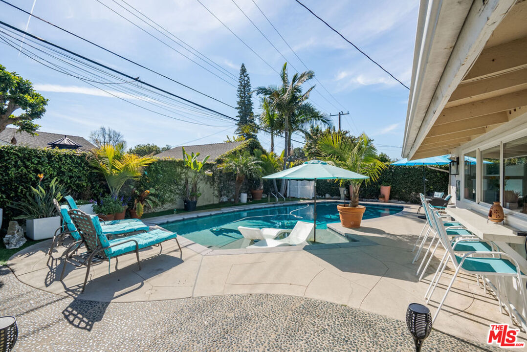 11332 Loch Lomond Road Los Alamitos, CA 90720 - Photo 46 of 55 a view of outdoor space yard deck patio and outdoor kitchen