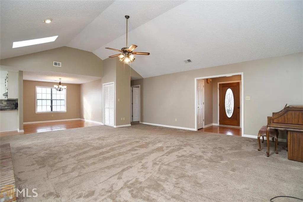 11058 Hunters Lane Hampton, GA 30228 - Photo 14 of 25 a view of livingroom with window