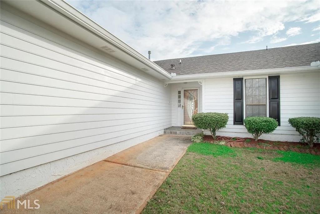 11058 Hunters Lane Hampton, GA 30228 - Photo 21 of 25 a view of backyard of house