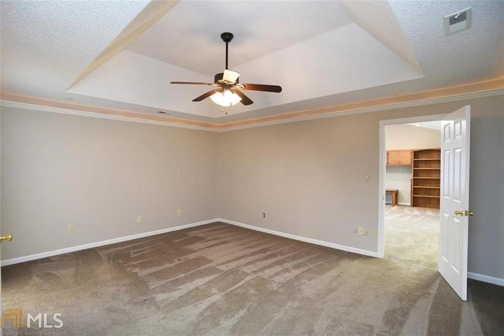 11058 Hunters Lane Hampton, GA 30228 - Photo 23 of 25 a view of an empty room with a window