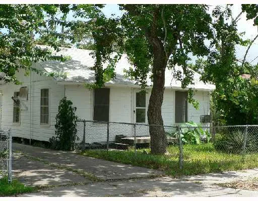 a front view of house with a yard