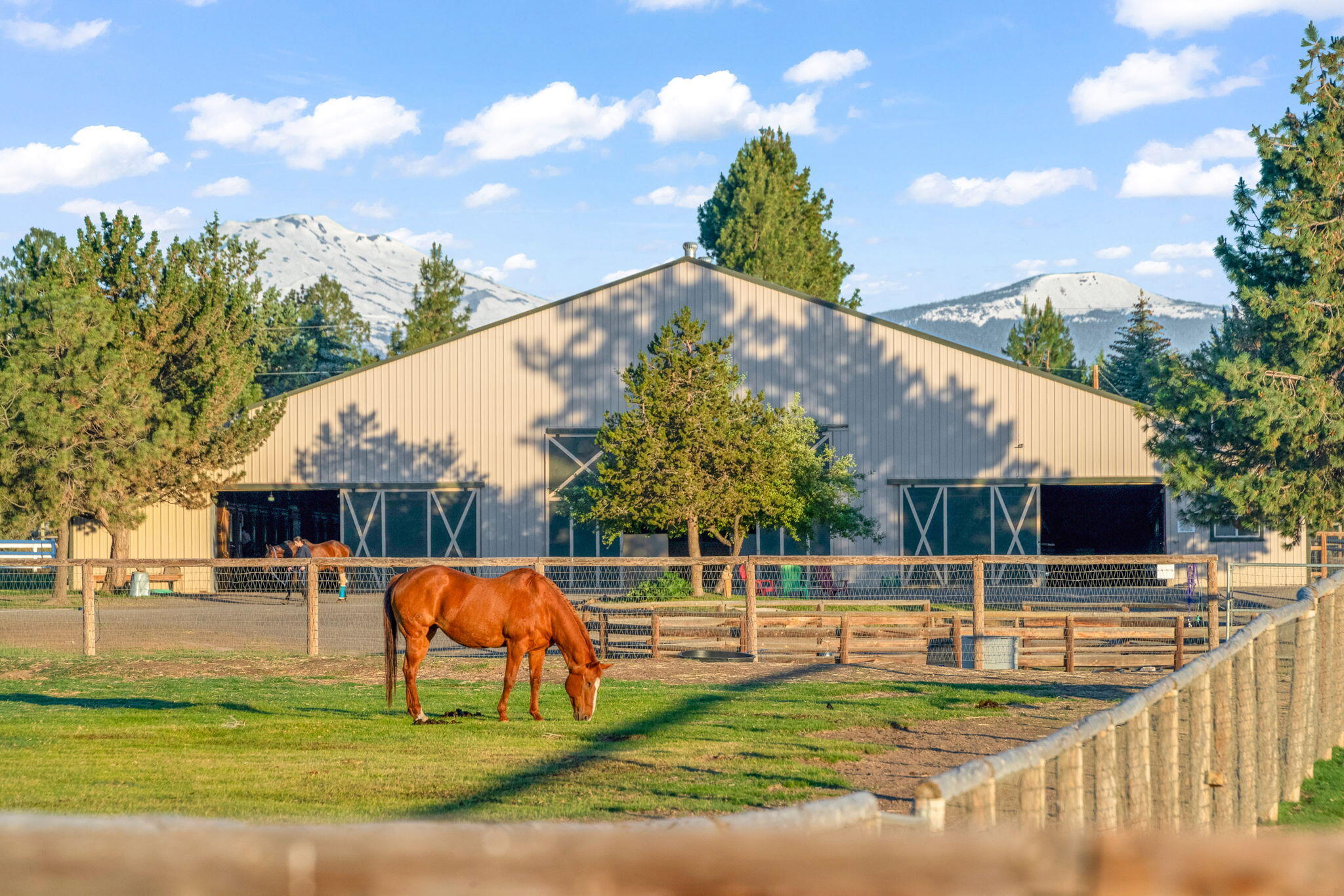 60360 Horse Butte Road Bend, OR 97702 - Photo 3 of 58 a view of a swimming pool with a patio