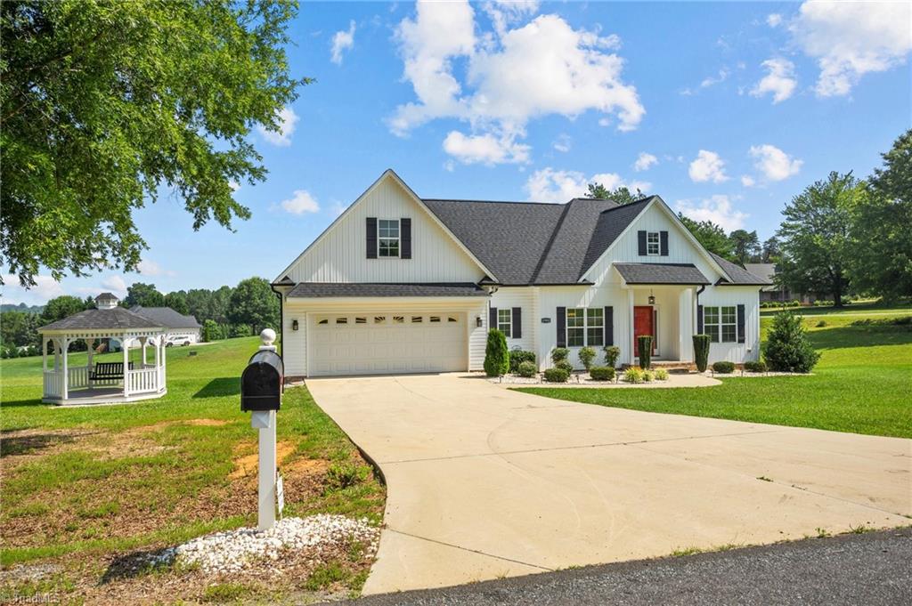 8900 Osage Road Stokesdale, NC 27357 - Photo 6 of 45 EXPANSIE DRIVEWAY AND AMPLE PARKING