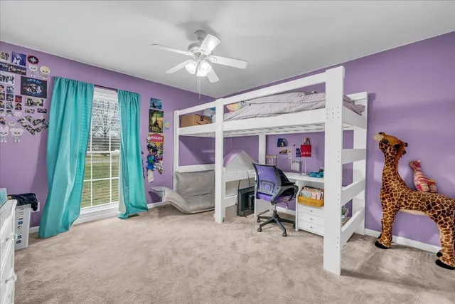 a bathroom with a sink a toilet and shower curtain