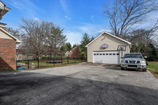 a view of street with parked cars
