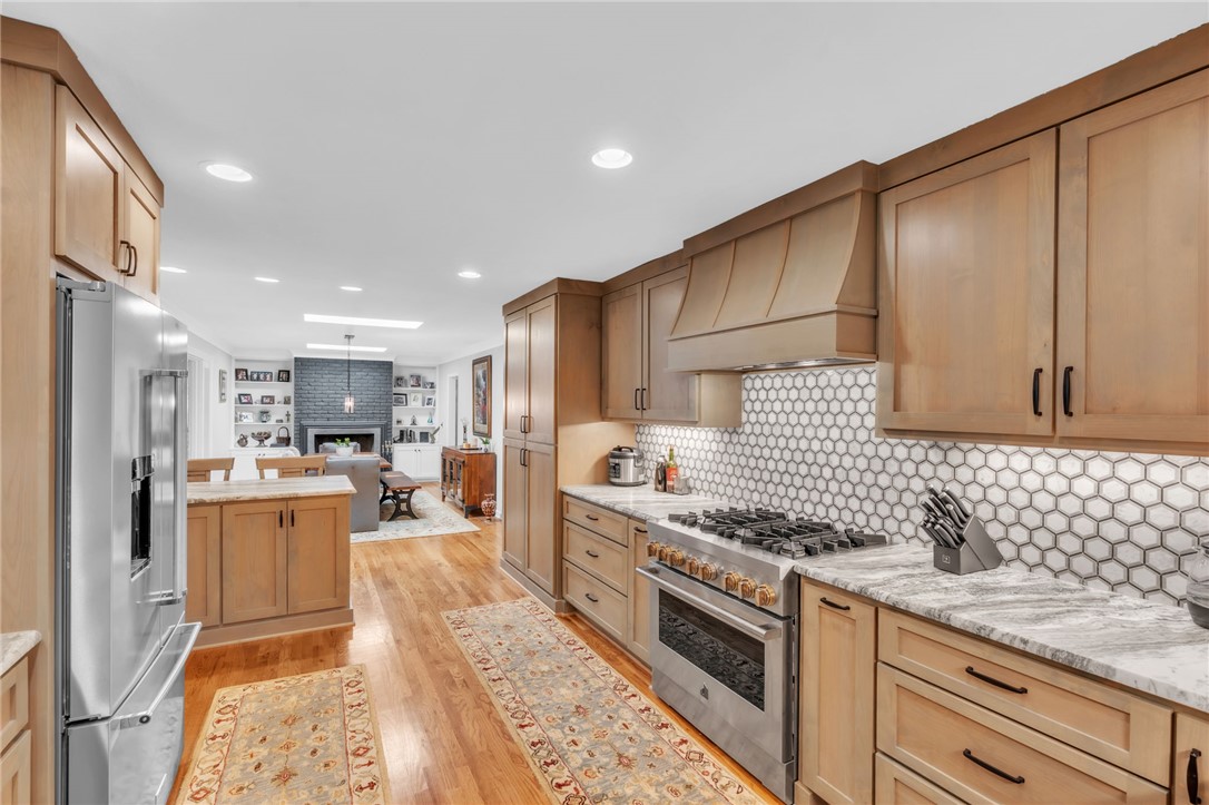 400 Arcadia Drive Anderson, SC 29621 - Photo 12 of 43 This bright and open kitchen features ample cabinetry, a large range, and beautiful hardwood floors.