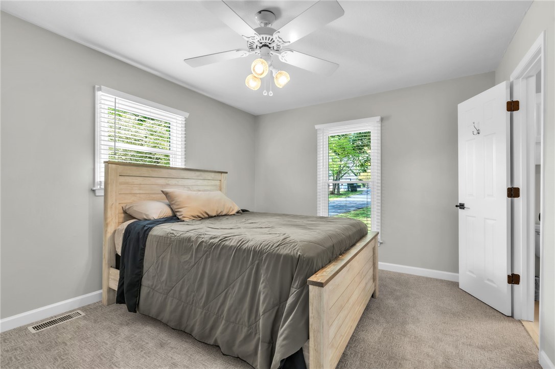 400 Arcadia Drive Anderson, SC 29621 - Photo 15 of 43 Bright and airy, this comfortable bedroom provides a serene retreat for rest and relaxation.