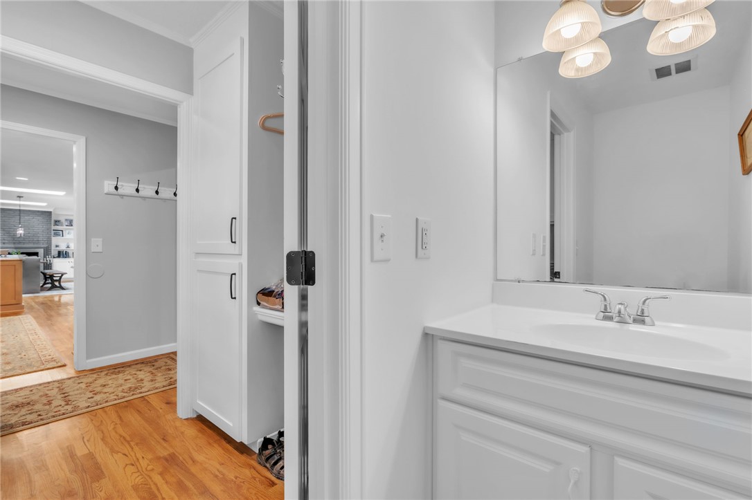 400 Arcadia Drive Anderson, SC 29621 - Photo 24 of 43 This functional powder room features a classic single vanity with a mirror, perfect for daily routines.
