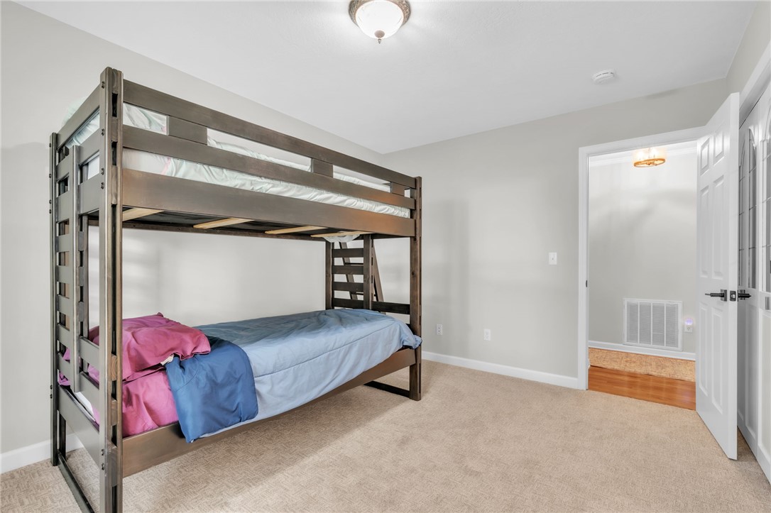 400 Arcadia Drive Anderson, SC 29621 - Photo 26 of 43 This cozy bedroom offers versatile sleeping arrangements and soft carpet underfoot.