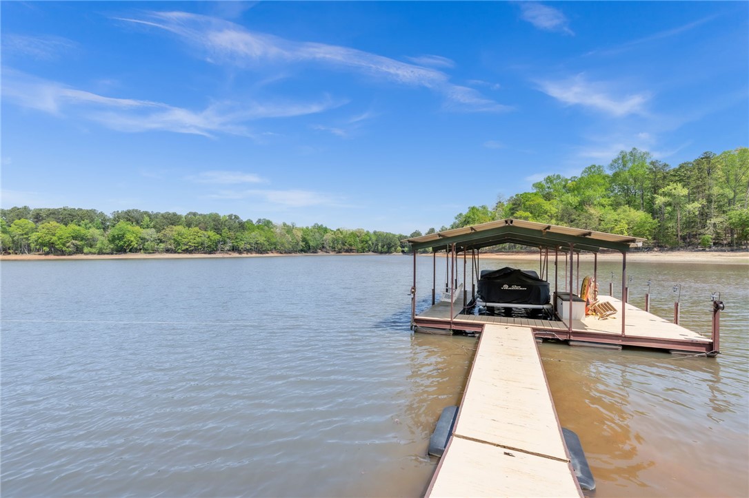 400 Arcadia Drive Anderson, SC 29621 - Photo 33 of 43 This serene waterfront retreat offers direct access to a private dock, perfect for boating enthusiasts.