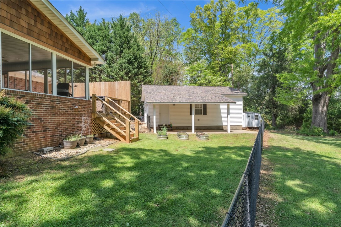 400 Arcadia Drive Anderson, SC 29621 - Photo 34 of 43 This spacious backyard offers privacy and room for various outdoor activities and entertainment.