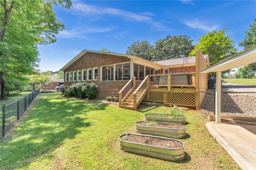 400 Arcadia Drive Anderson, SC 29621 - Photo 35 of 43 This home features a lush yard and a spacious deck for outdoor enjoyment.