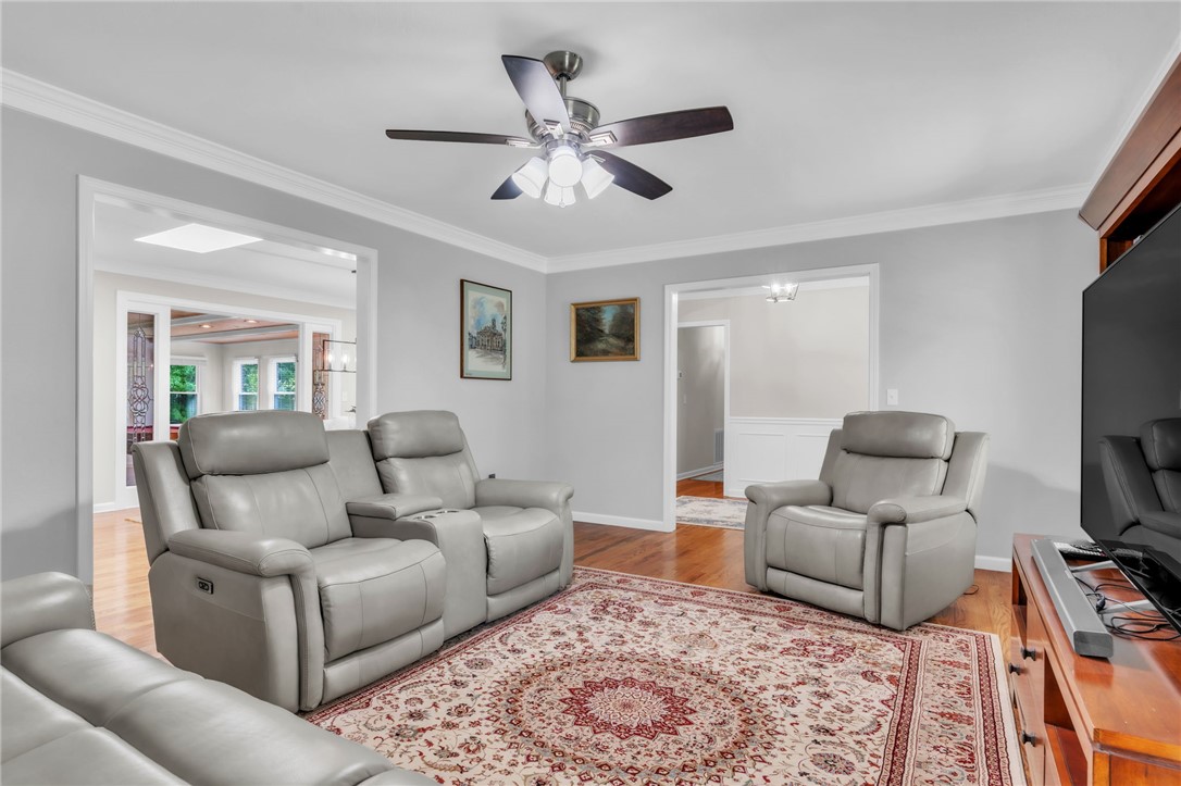 400 Arcadia Drive Anderson, SC 29621 - Photo 4 of 43 This inviting living room features gleaming hardwood floors and crown molding.
