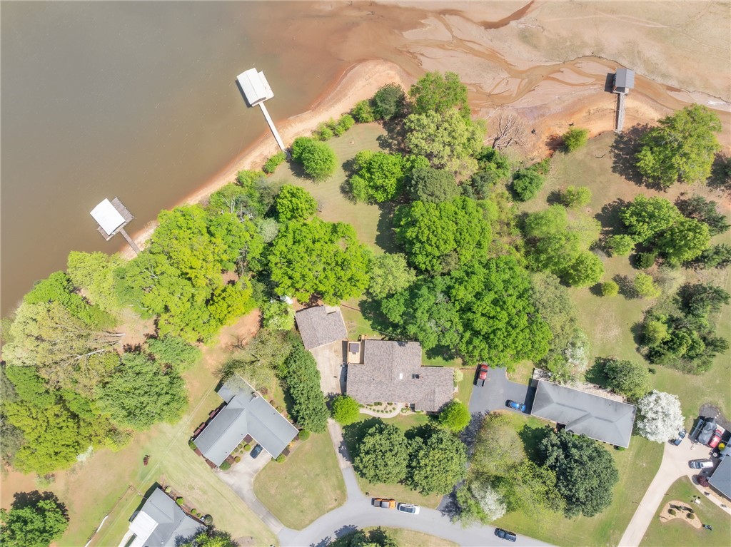 400 Arcadia Drive Anderson, SC 29621 - Photo 42 of 43 Aerial view of a home nestled by the lake, complete with private docks and lush surroundings.