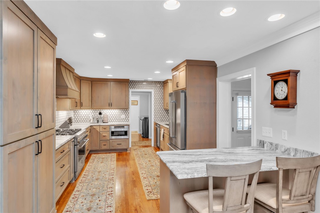 400 Arcadia Drive Anderson, SC 29621 - Photo 7 of 43 This spacious kitchen offers ample countertop space and a large island perfect for culinary pursuits.