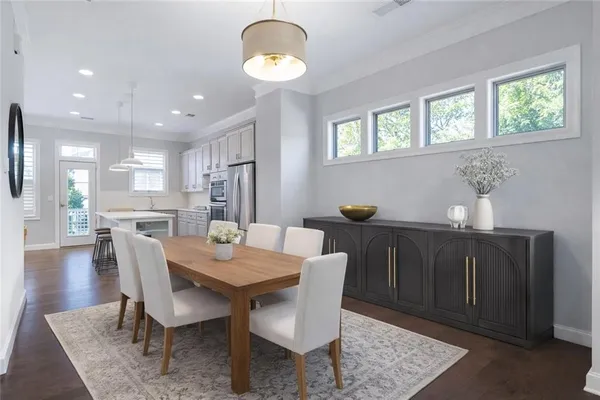 a view of a dining room with furniture