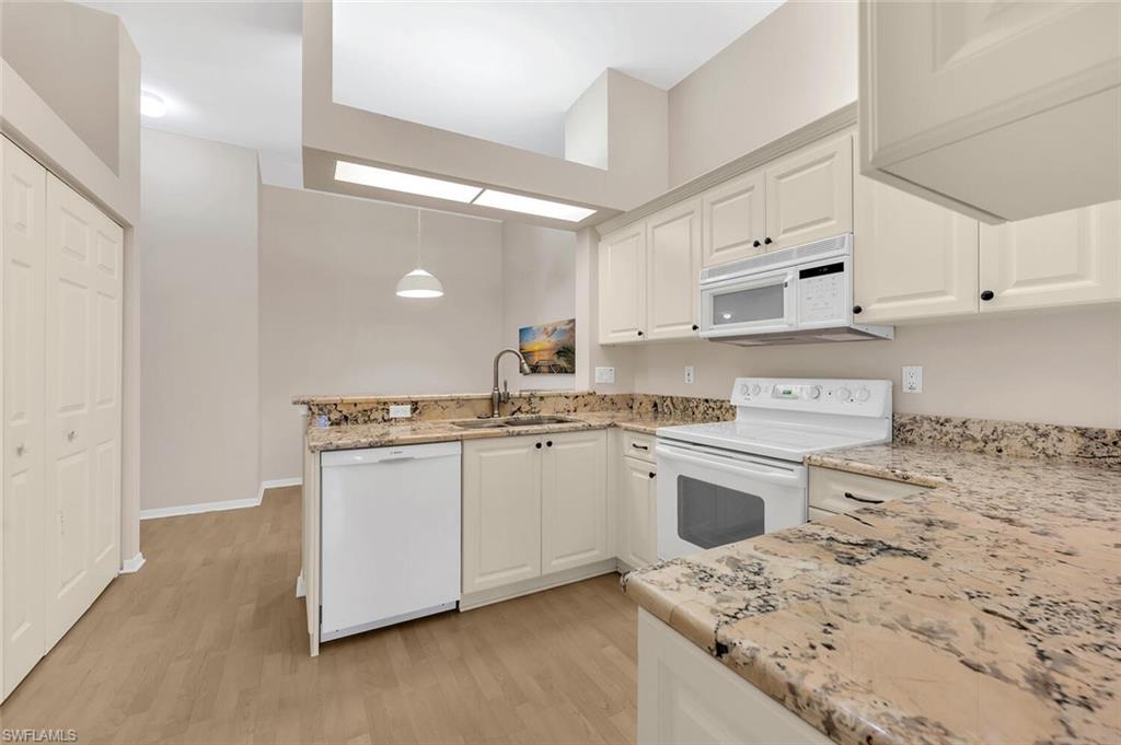 7465 Jacaranda Park Road, Unit R202 Naples, FL 34109 - Photo 11 of 33 Kitchen