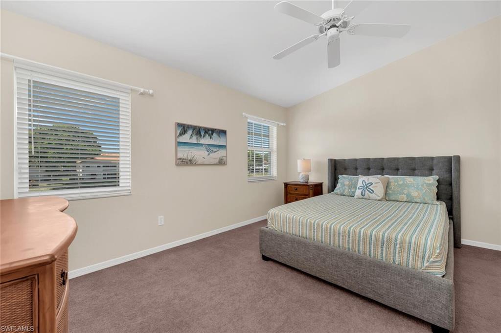 7465 Jacaranda Park Road, Unit R202 Naples, FL 34109 - Photo 16 of 33 Master Bedroom w/ Lake Views