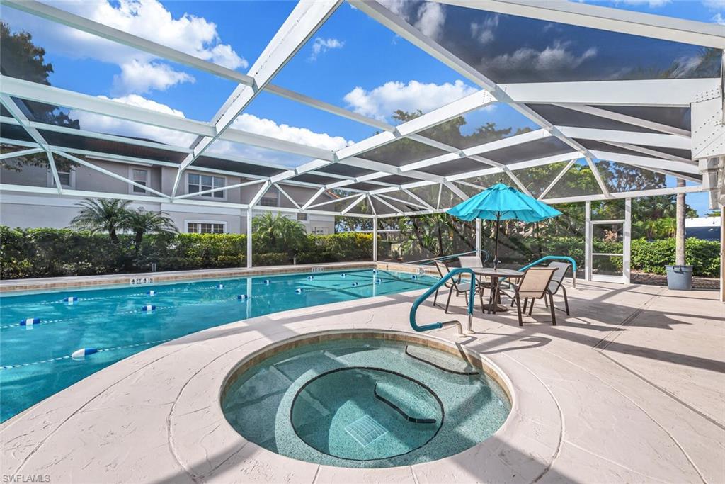 7465 Jacaranda Park Road, Unit R202 Naples, FL 34109 - Photo 21 of 33 Community Pool/Spa