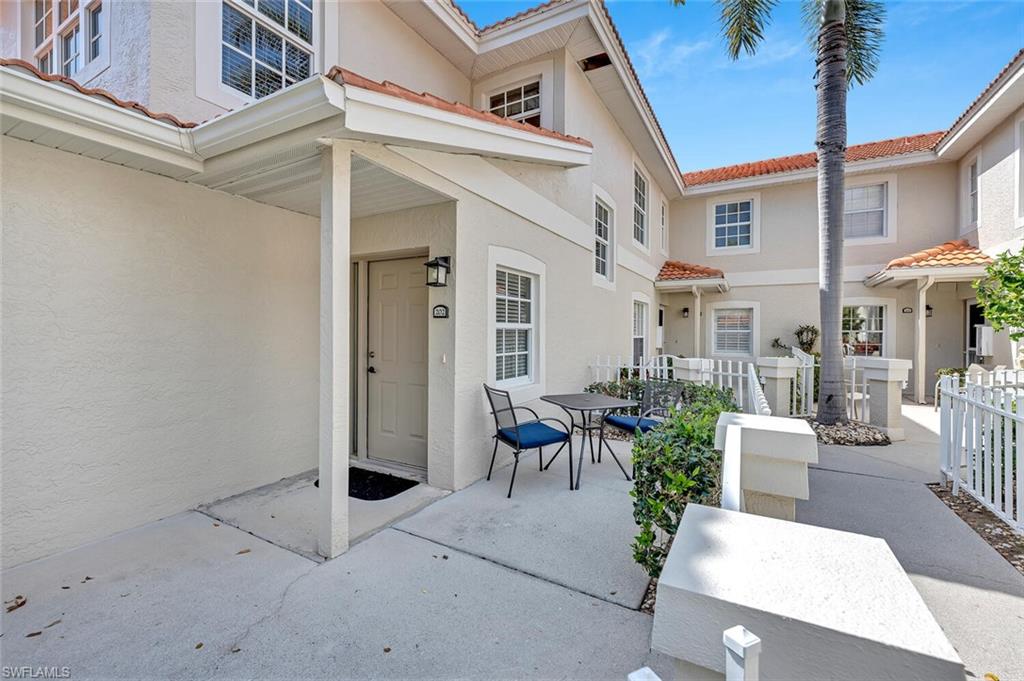 7465 Jacaranda Park Road, Unit R202 Naples, FL 34109 - Photo 3 of 33 Courtyard/ Grilling Allowed!