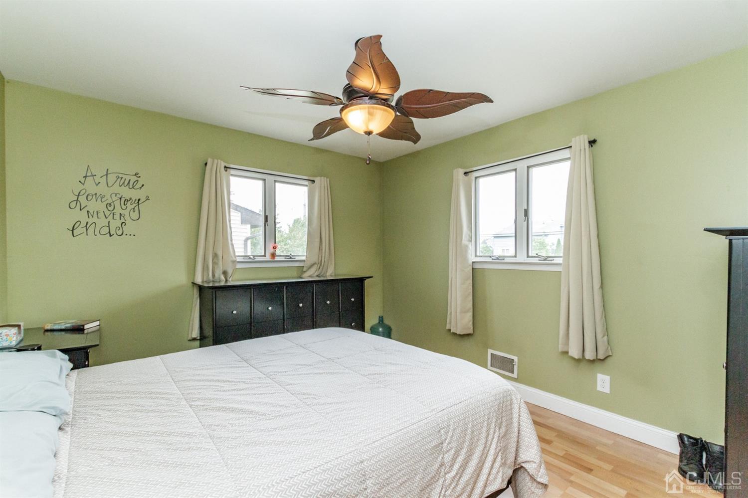 13 Argonne Avenue Hamilton, NJ 08620 - Photo 13 of 24 a bedroom with a bed and a window