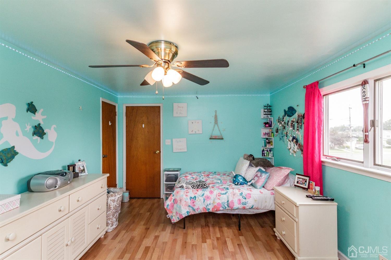 13 Argonne Avenue Hamilton, NJ 08620 - Photo 15 of 24 a bedroom with a bed and wooden floor