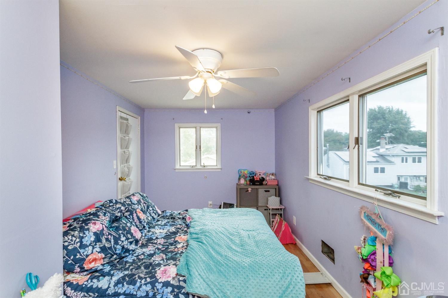 13 Argonne Avenue Hamilton, NJ 08620 - Photo 18 of 24 a bedroom with furniture and a window