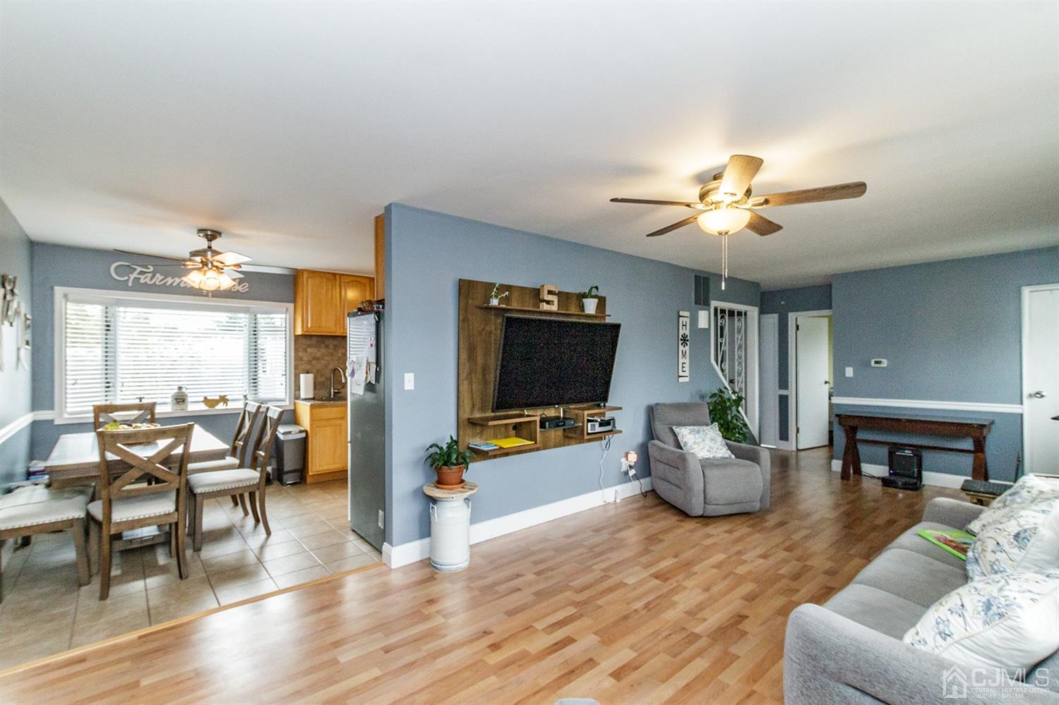13 Argonne Avenue Hamilton, NJ 08620 - Photo 5 of 24 a living room with furniture and a flat screen tv