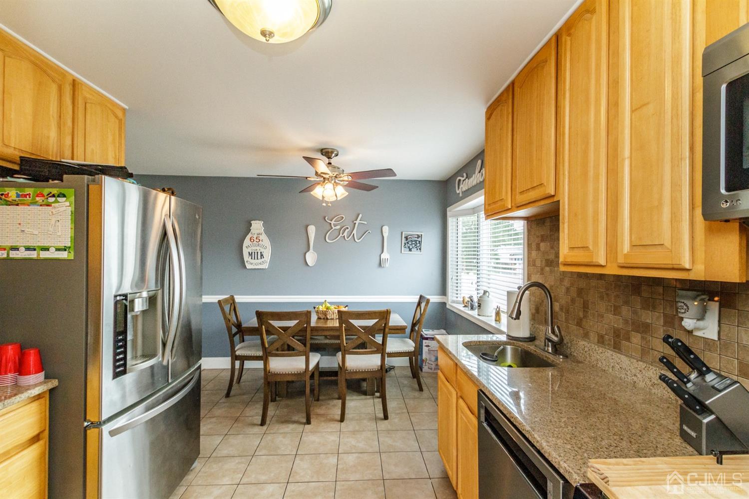 13 Argonne Avenue Hamilton, NJ 08620 - Photo 8 of 24 a kitchen with a sink appliances and cabinets