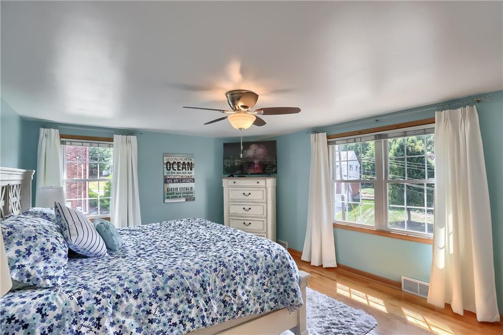 8381 Post Road Allison Park, PA 15101 - Photo 13 of 25 Ascend to the second level via the hardwood staircase with wrought iron railing. Step into the master suite, a private oasis.