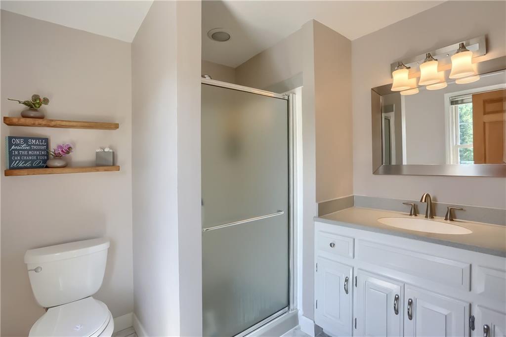 8381 Post Road Allison Park, PA 15101 - Photo 15 of 25 The private en suite boasts an oversized vanity and a shower.