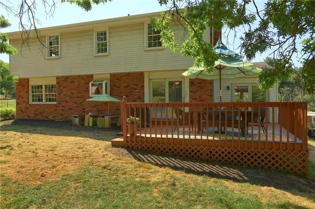 8381 Post Road Allison Park, PA 15101 - Photo 23 of 25 Enjoy the outdoors on the rear deck, accessible from the family room and four seasons room.