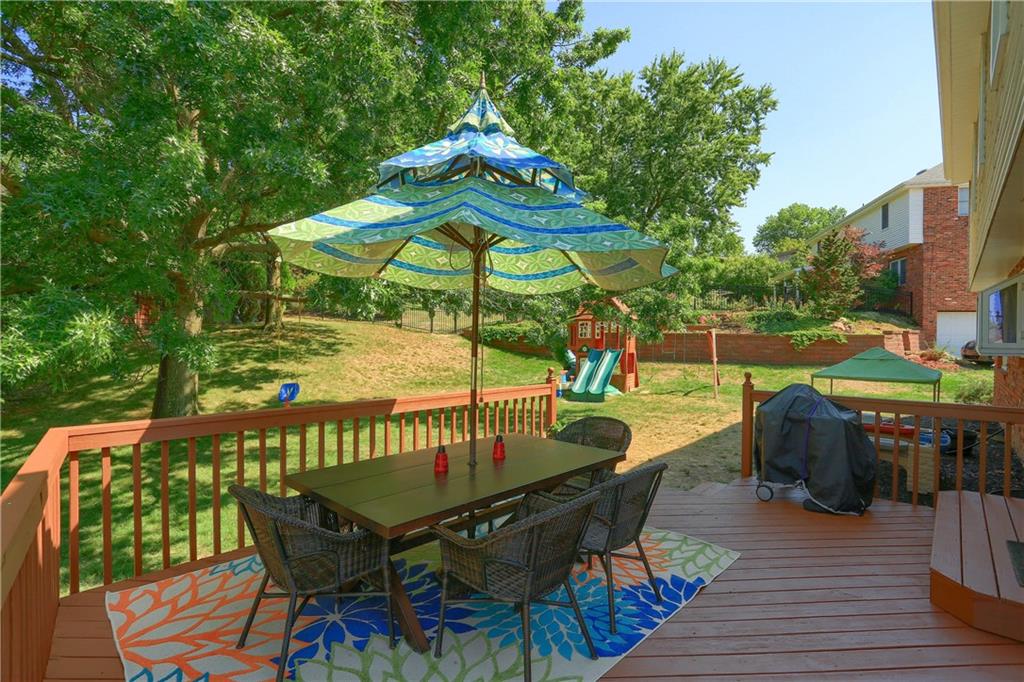 8381 Post Road Allison Park, PA 15101 - Photo 24 of 25 The rear deck looks out to the expansive rear yard featuring ample space to enjoy your favorite outdoor activities with friends and family.