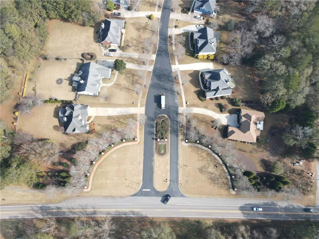 4240 Bold Springs Road Monroe, GA 30656 - Photo 7 of 8 an aerial view of a house with a yard