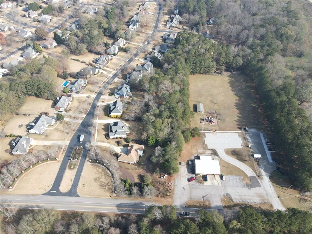 4240 Bold Springs Road Monroe, GA 30656 - Photo 8 of 8 an aerial view of residential houses with outdoor space