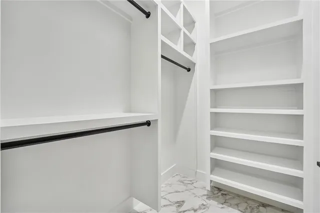 a view of a hallway with windows