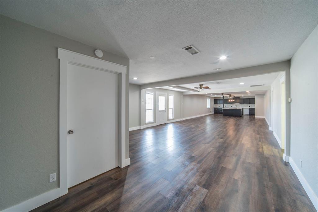 127 County Road 3051 Decatur, TX 76234 - Photo 11 of 35 a view of empty room with wooden floor