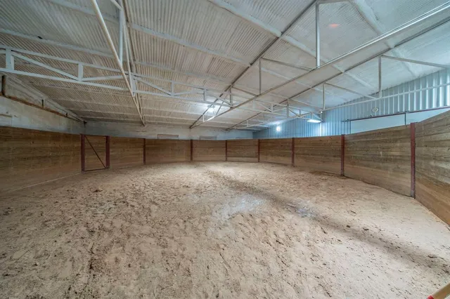 a view of a room with wooden walls