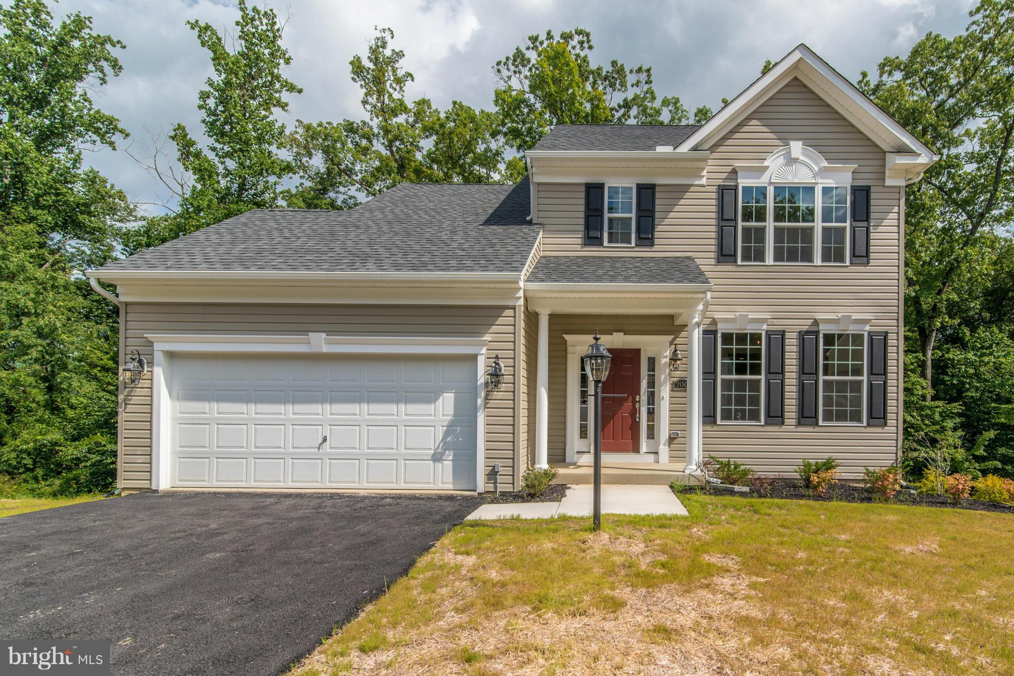 11 Cassidy Court Point of Rocks, MD 21777 - Photo 1 of 30 a front view of a house with a yard and garage