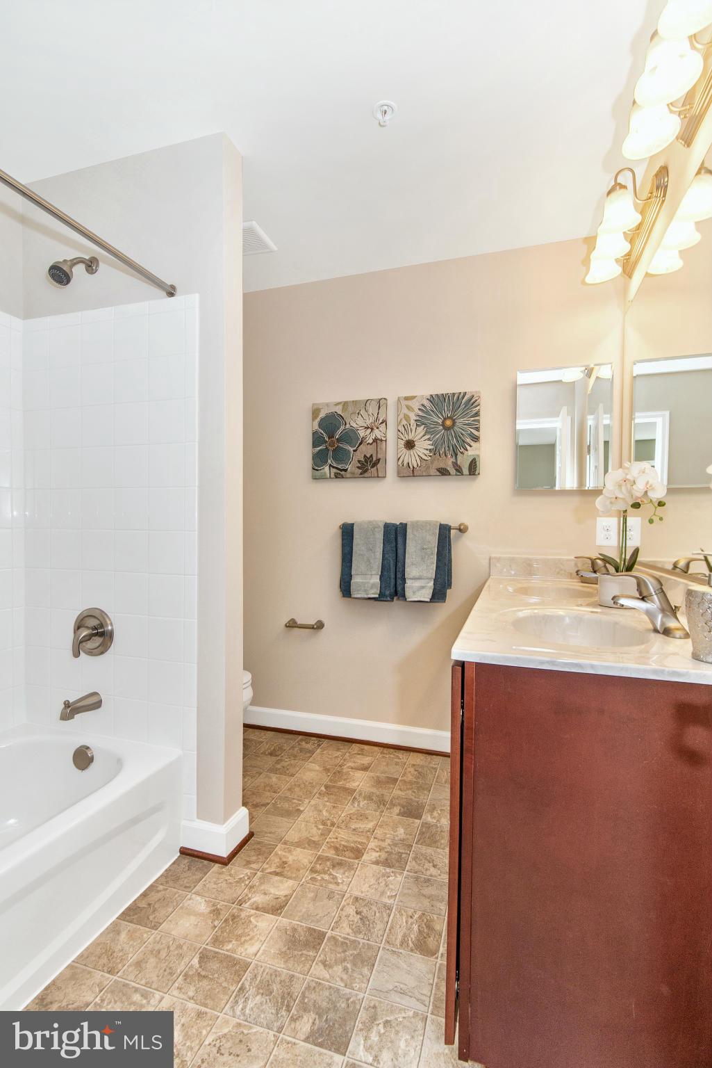 11 Cassidy Court Point of Rocks, MD 21777 - Photo 23 of 30 a bathroom with a tub a sink and a shower