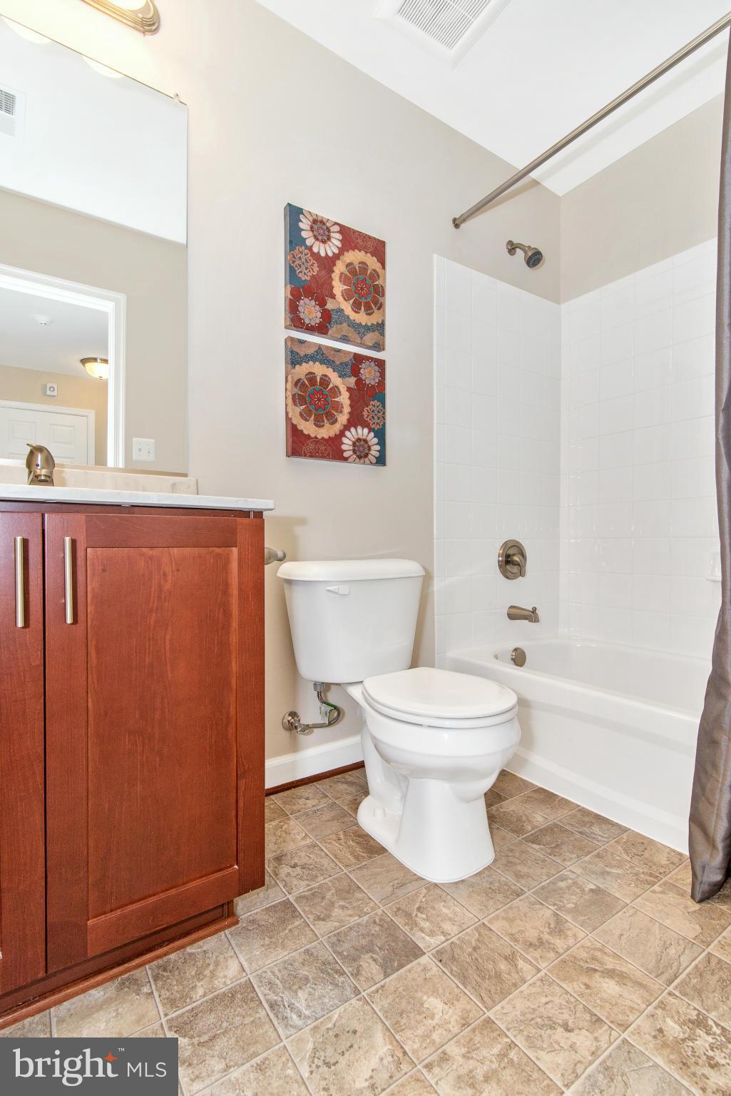 11 Cassidy Court Point of Rocks, MD 21777 - Photo 25 of 30 a bathroom with a toilet and a shower curtain