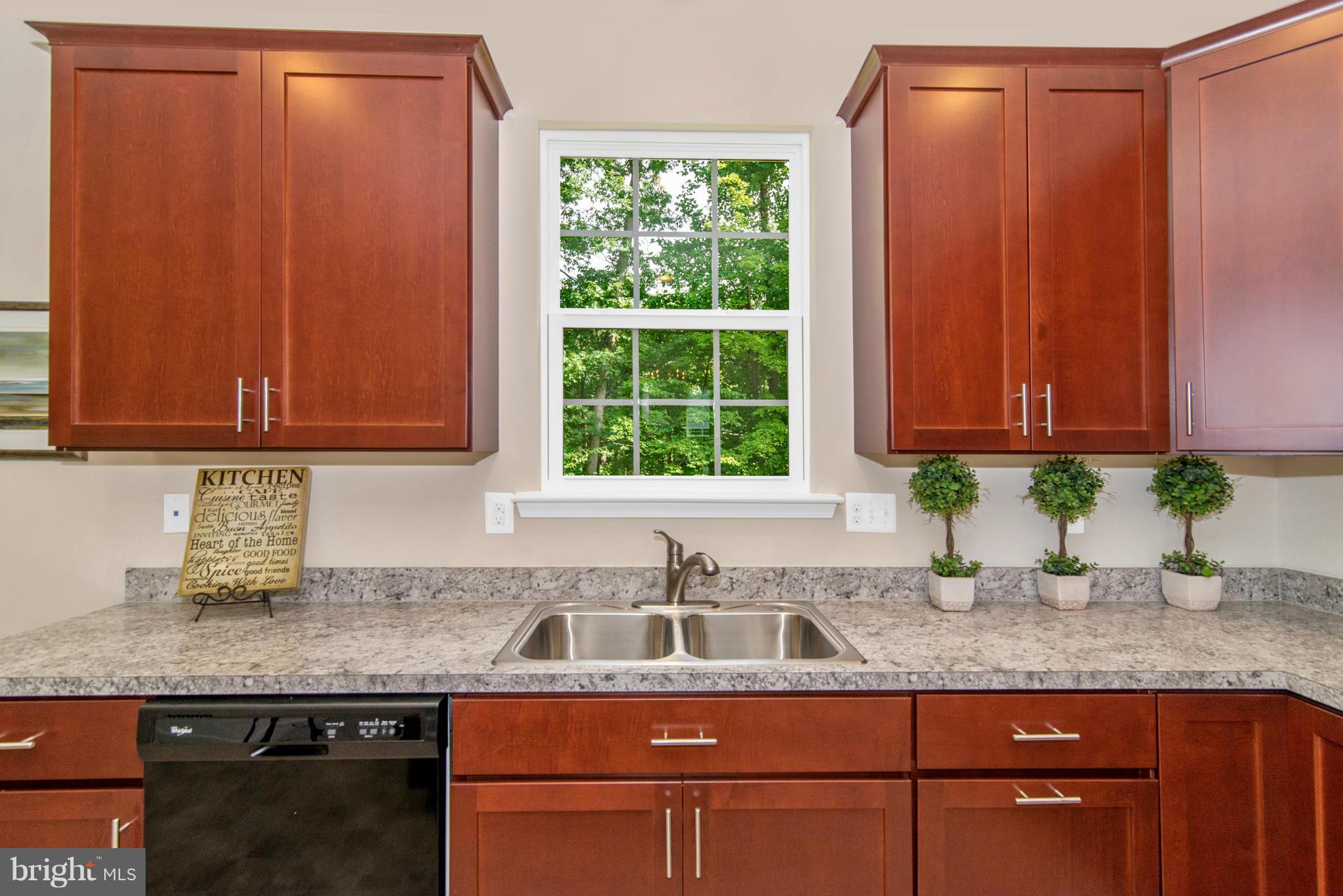 11 Cassidy Court Point of Rocks, MD 21777 - Photo 9 of 30 a kitchen with granite countertop cabinets sink and window