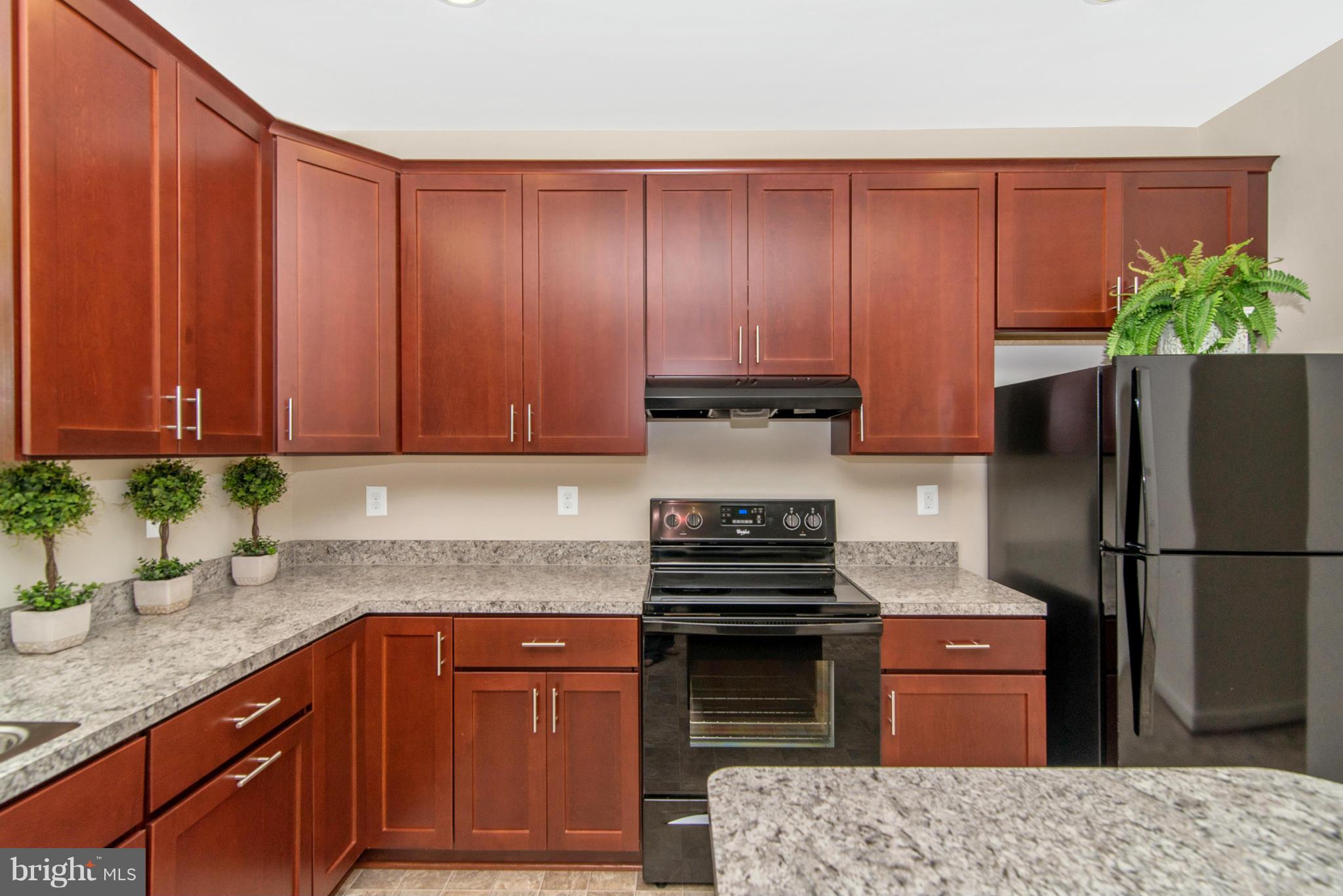11 Cassidy Court Point of Rocks, MD 21777 - Photo 10 of 30 a kitchen with stainless steel appliances granite countertop a refrigerator stove and sink