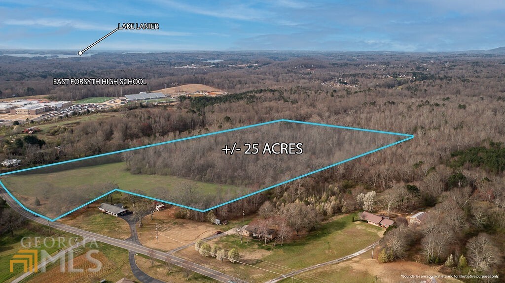 a view of a swimming pool with a yard