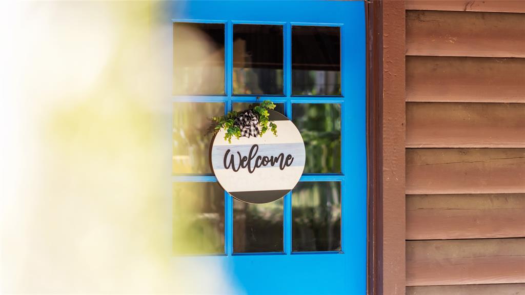 313 Post Oak Road Broken Bow, OK 74728 - Photo 2 of 40 a sign that is on a wall