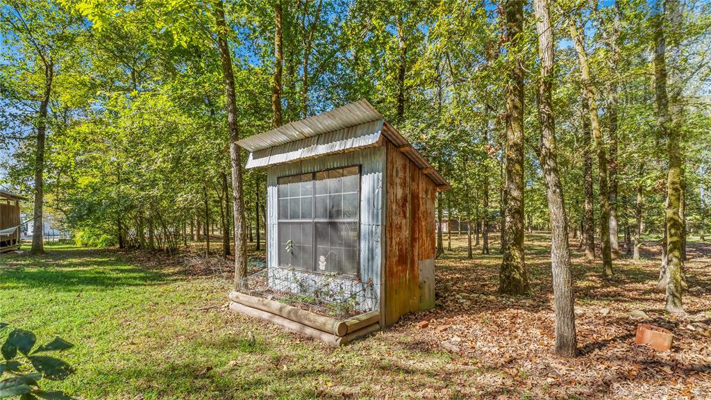 313 Post Oak Road Broken Bow, OK 74728 - Photo 39 of 40 a view of outdoor space and yard