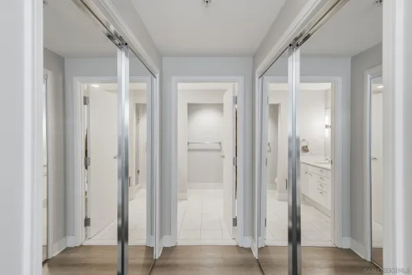a view of a bathroom with a sink and shower