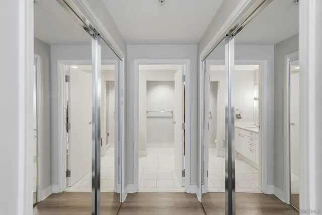 a view of a bathroom with a sink and shower