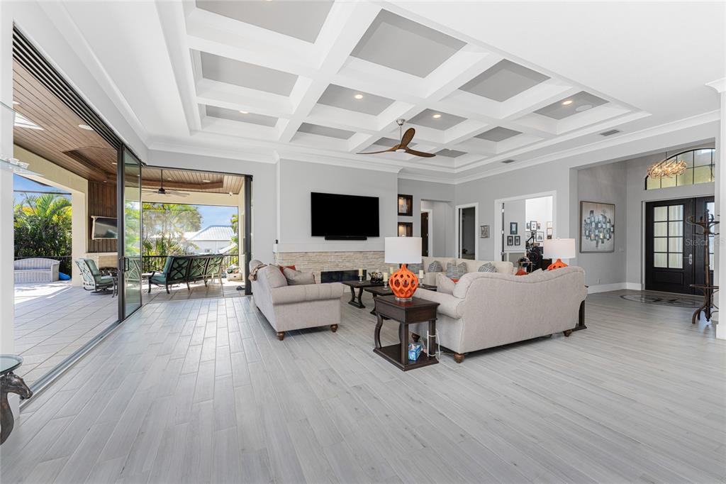 265 Severin Road Southeast Port Charlotte, FL 33952 - Photo 13 of 88 a living room with furniture and a flat screen tv